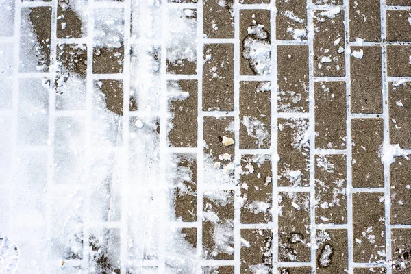 Hintergrund mit Schnee auf Gehweg im Winter, Textur — Stockfoto