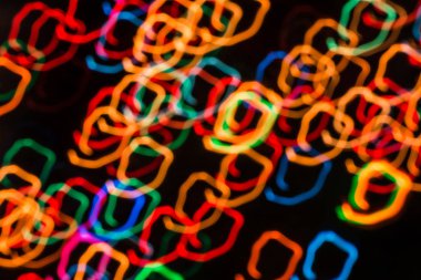 Işıkları gece bulanık hareket veya fireworks uygulamasında yeni yıl arifesinde arka plan