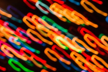 Işıkları gece bulanık hareket veya fireworks uygulamasında yeni yıl arifesinde arka plan