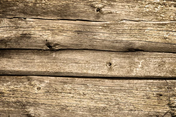 Textura de madera, fondos de madera. Gnarled, tablas vintage de viejos graneros — Foto de Stock