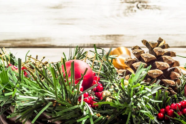 Holiday decoration. Christmas wreath on wooden background. — Stock Photo, Image