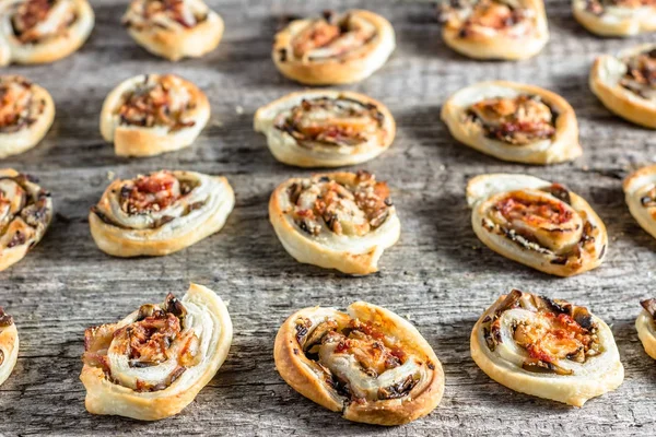 Puff pastry rolls, snack with tomato and mushrooms, home made pastries, baking concept — Stock Photo, Image