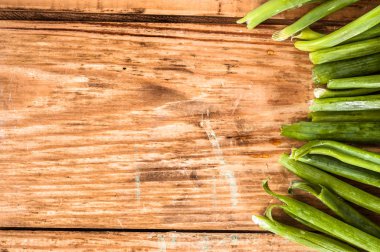 Farm fresh vegetables. Organic fresh green chive on wooden background.