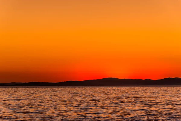 Orange sunset on sea horizon, landscape, Dalmatia, Croatia — Stock Photo, Image