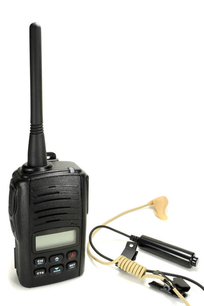 Portable walkie-talkie with headset isolated on a white background