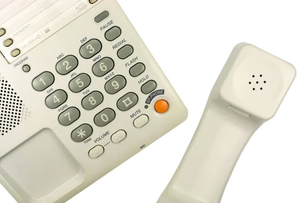 Telefone de escritório isolado em um fundo branco — Fotografia de Stock