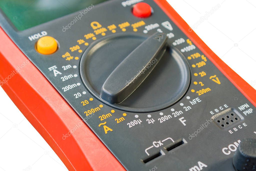 Fragment of digital multimeter closeup isolated on white background