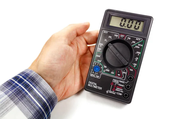 Digital multimeter in man's hand on a white background — Stock Photo, Image