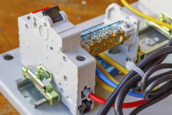 Automatic circuit breaker installed on a DIN-rail — Stock Photo, Image