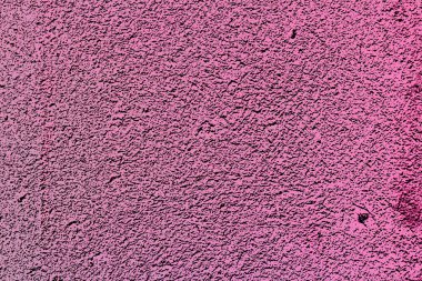 Beton duvar doku pembe renkte boyanmış. Arka plan
