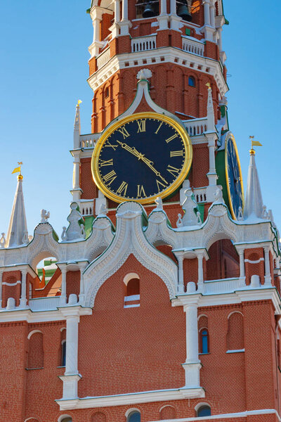 Moscow, Russia - February 01, 2018: Chimes clock of the Spasskaya Tower of Moscow Kremlin closeup. Moscow Kremlin in winter