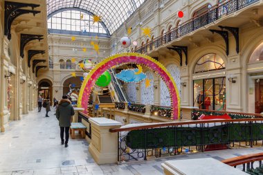 Moscow, Russia - November 21, 2019: New Year installations at interiors of GUM State Department Store on Red square in Moscow historical center. Christmas in Moscow