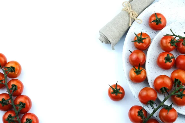 small cherry tomatoes on a white background