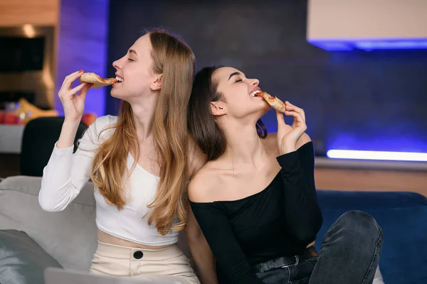 Two women having fun at home, opening pizza box, food delivery, home party — Stock Photo, Image