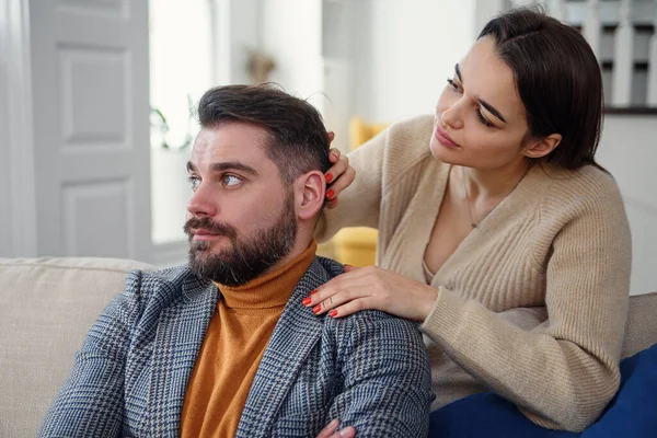 Attractive woman apologizing to frustrated man after quarrel, doubting boyfriend ignore, girlfriend feeling guilty, asking forgive her, begging pardon, admits mistake, regret, couple having problem — Stock Photo, Image