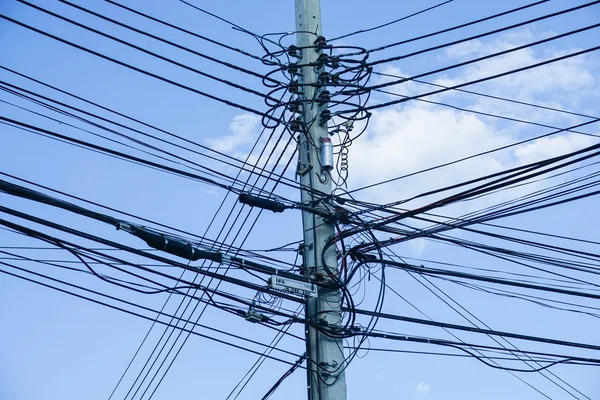 Electricity pole with electricity wire with sky background — Stockfoto