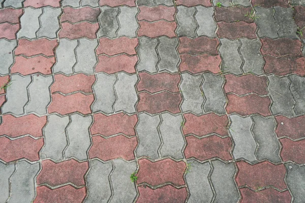 Pasarela de ladrillos de hormigón rojo y gris —  Fotos de Stock