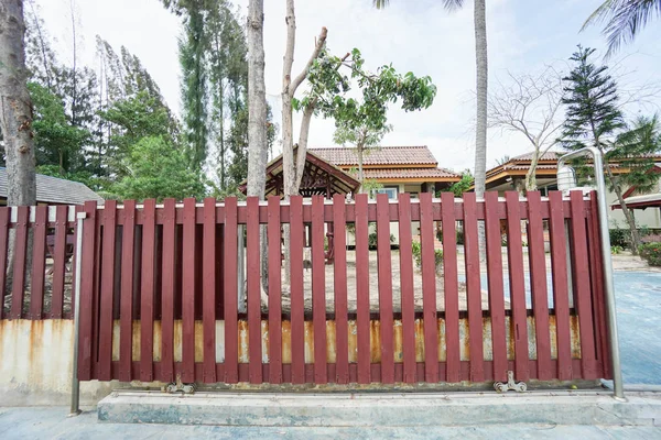 Red wooden slide front door of house — Stock Photo, Image