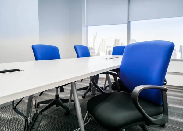 blue office chair with backrest in meeting room for seating
