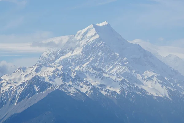 white snow on mountain peak of Mt. Cook in winter season with bright sunlight