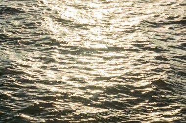 su yakından doku günbatımı dalgalar