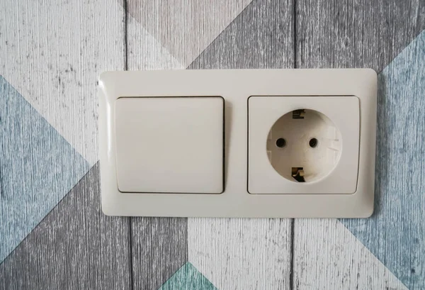 家庭用電源用のライトスイッチとプラグソケット — ストック写真