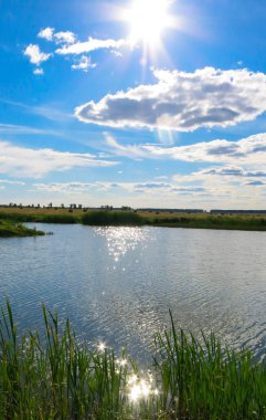 Göl, gökyüzü, güneş