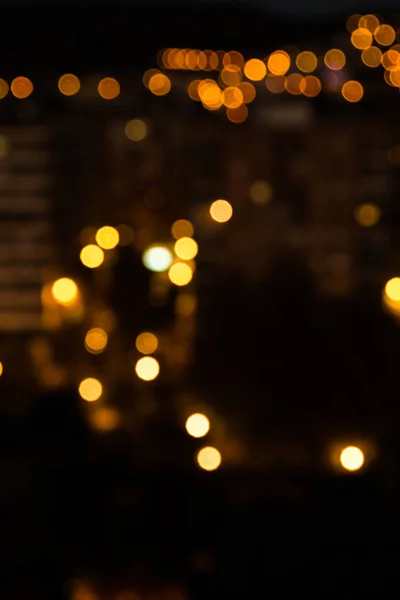Rozostření pouliční osvětlení v noci město — Stock fotografie