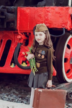 Üniformalı çocuk. Askerler, anavatan savunucuları. 