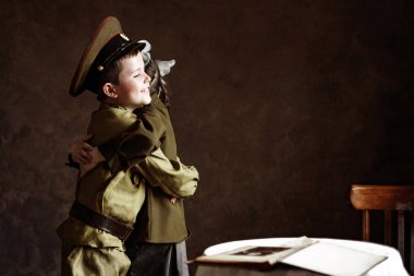 Üniformalı çocuklar, Anavatan 'ın koruyucuları. Askeri tema. Askeri üniforma..