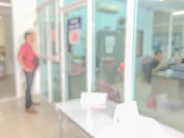 Blurred image of counter service at hotel for background usage.B