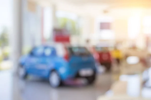 Desfoque de fundo do carro e showroom.Businessmen borrão no trabalho — Fotografia de Stock