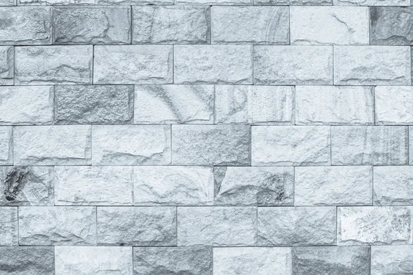 Black and white brick wall texture background /  have me to flooring rock stone old pattern clean concrete grid uneven bricks design stack and modern or office interior and homework .