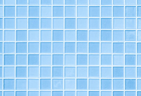 Blue tile wall brick seamless background and texture .