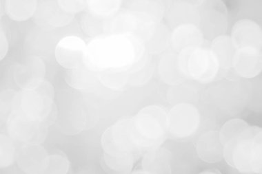 Arka planda bulanık noel kar ışıkları.