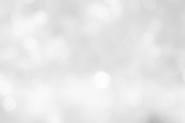 Gray and white nature blurred color glow colorful light sparkling summer. Valentine's day blurry concept. Abstract white bokeh texture with soft foreground bubble shiny in grey vintage style bright.