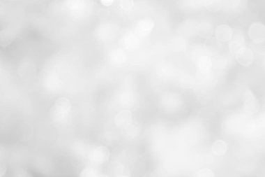 Gray and white nature blurred color glow colorful light sparkling summer. Valentine's day blurry concept. Abstract white bokeh texture with soft foreground bubble shiny in grey vintage style bright.
