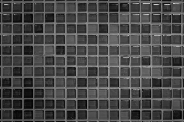 Mur carrelage noir haute résolution photo réelle ou brique motif sans couture et texture arrière-plan de la pièce. Carreaux en mailles foncées texture des murs pour la décoration de la chambre, de la maison ou du bureau. — Photo