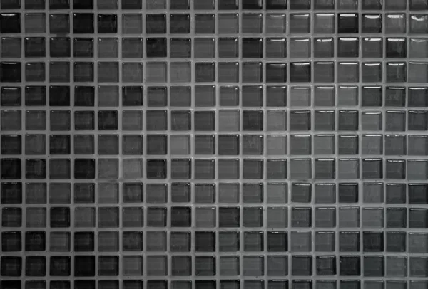 Schwarze Fliesenwand mit hoher Auflösung echtes Foto oder Ziegel nahtlose Muster und Textur Innenraum Hintergrund. Dunkle Gitterfliesen Wandtextur für die Dekoration des Schlafzimmers, Wohn- oder Bürokulisse. — Stockfoto
