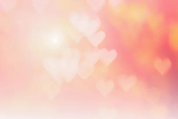 Blurred background of Valentine's day concept. Pink Valentines Day Card. Pastel color tone soft have gradient pattern. Multicolor white pink, orange and red hearts blur wallpaper in love bright sexy. — Stockfoto