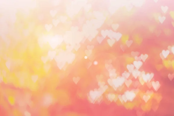 Размытый фон концепции Дня Святого Валентина. Розовая валентинка. Цвет пастельных тонов мягкий. Разноцветные белые розовые, оранжевые и красные сердца размывают обои в любви ярко сексуальной . — стоковое фото