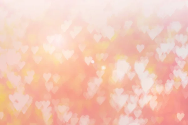 Blurred background of Valentine's day concept. Pink Valentines Day Card. Pastel color tone soft have gradient pattern. Multicolor white pink, orange and red hearts blur wallpaper in love bright sexy. — Stockfoto