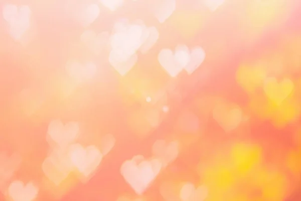 Blurred background of Valentine's day concept. Pink Valentines Day Card. Pastel color tone soft have gradient pattern. Multicolor white pink, orange and red hearts blur wallpaper in love bright sexy. — Stockfoto
