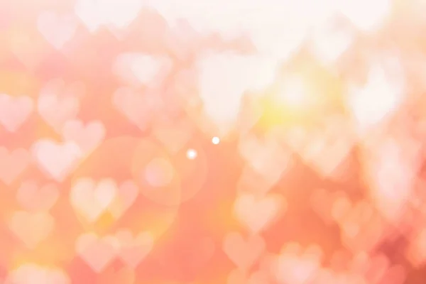 Blurred background of Valentine's day concept. Pink Valentines Day Card. Pastel color tone soft have gradient pattern. Multicolor white pink, orange and red hearts blur wallpaper in love bright sexy. — Stockfoto