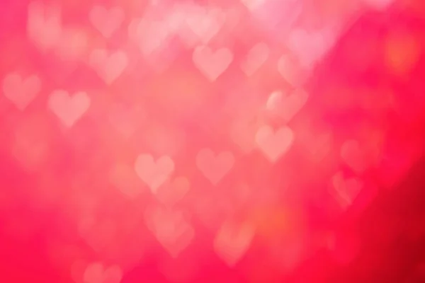 Red heat passionate and glamour bright bokeh background.Heart shaped bokeh red abstract background banner.  Love theme illustration. Valentines day concept. Copy space. Decorative glitter design. — Stockfoto