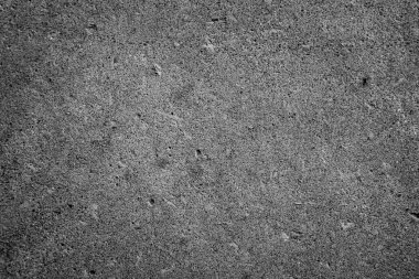 Siyah arka plan için sanat simsiyah beton dokusu. Renkli, karalanmış yüzey duvarı kaplaması soyut renkli kağıt çizikleri eski, eski, eskimiş çimento ve kum rengi koyu renk detay örtüsü var. Beton dokusu. Siyah beton parçası.