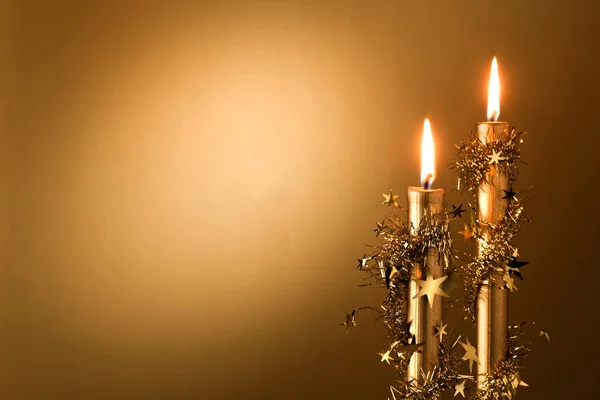 Yıldızlar iki altın mumlar