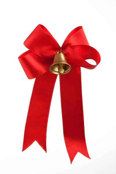 Beyaz zemin üzerine kırmızı kurdele ile çan