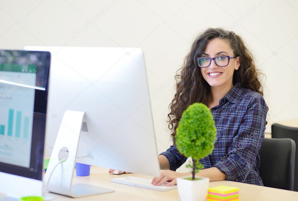 Female software developer working on computer Stock Photo by ©FS-Stock  127337364
