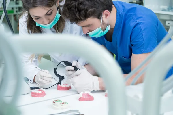 Dental prosthesis working on the denture — Stockfoto